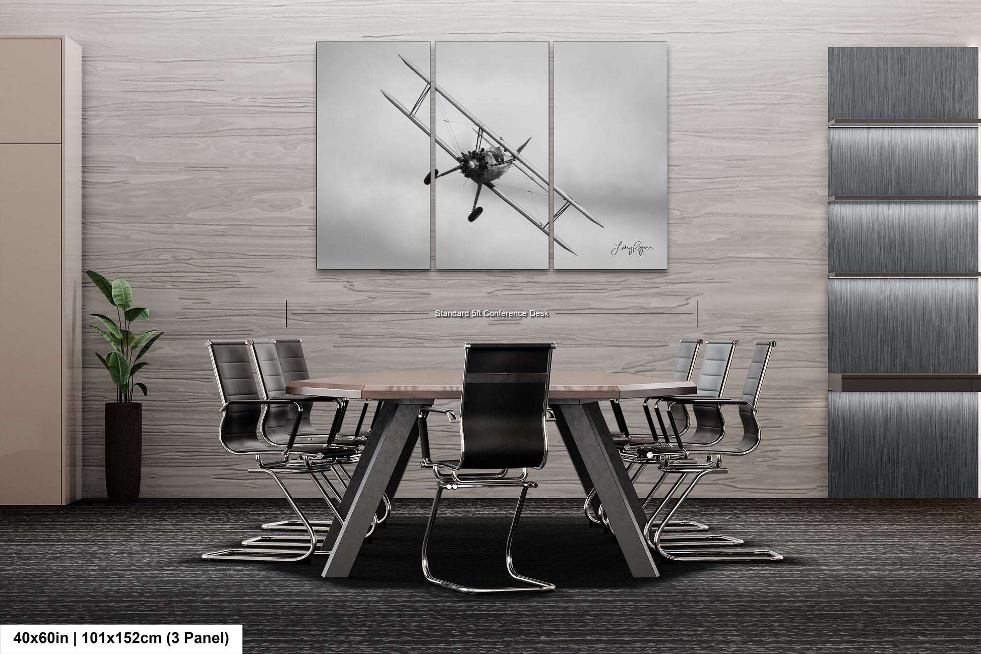 a black and white photo of a table and chairs