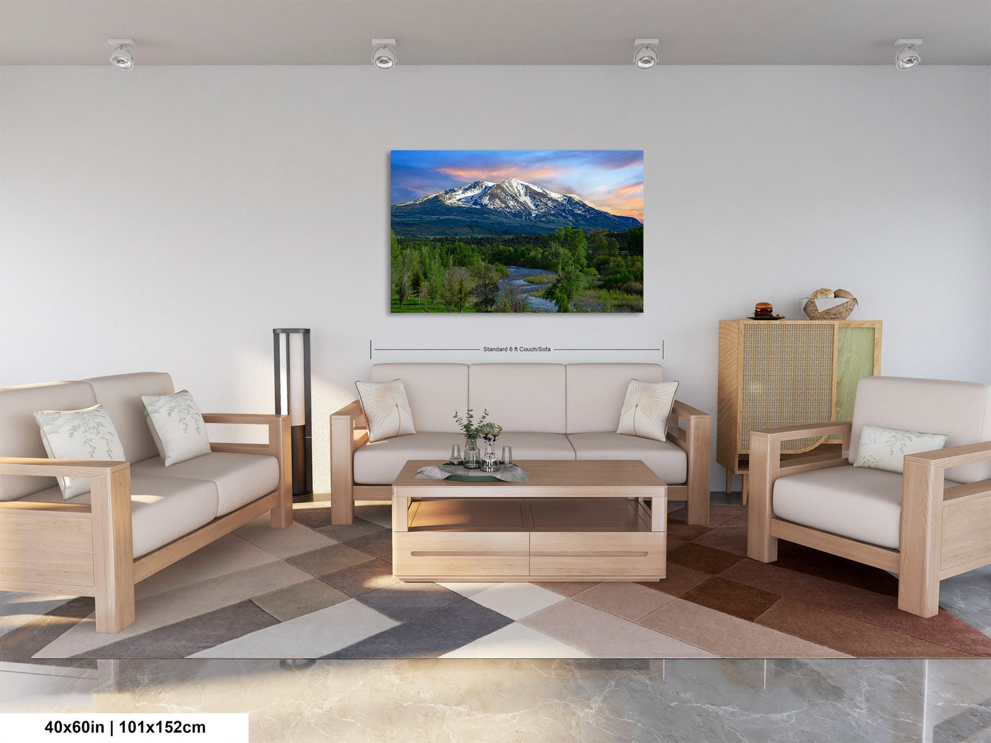 a living room filled with furniture and a painting on the wall