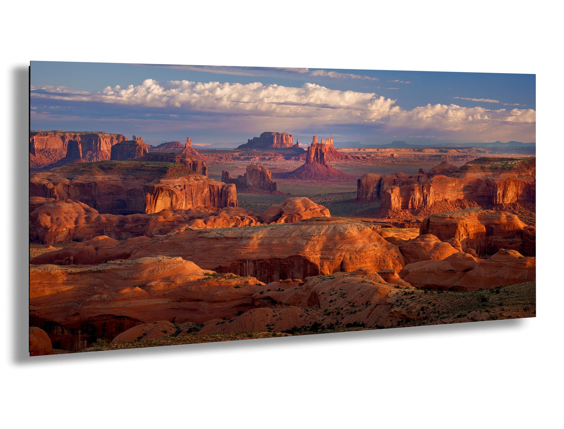 a scenic view of the desert with mountains in the background