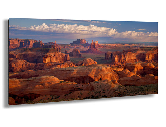 a scenic view of the desert with mountains in the background