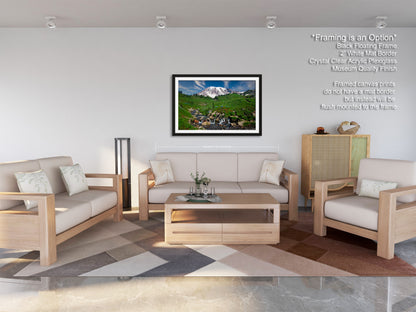 a living room filled with furniture and a painting on the wall
