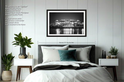a black and white photo of a bedroom