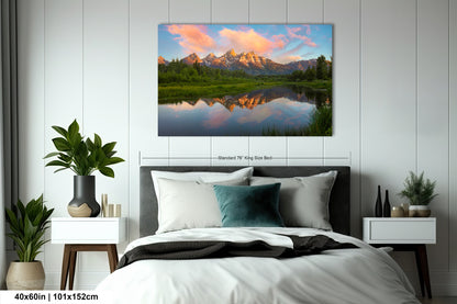 a bedroom with a bed and a painting on the wall