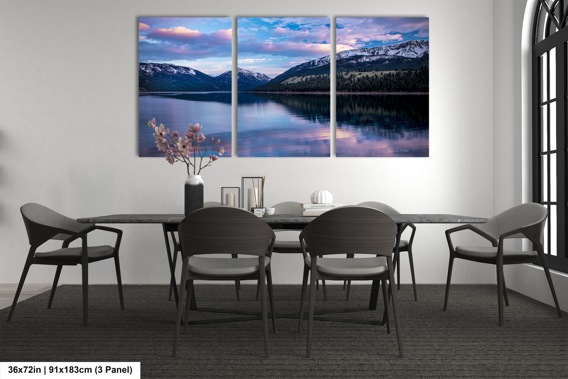 a dining room with a table and chairs
