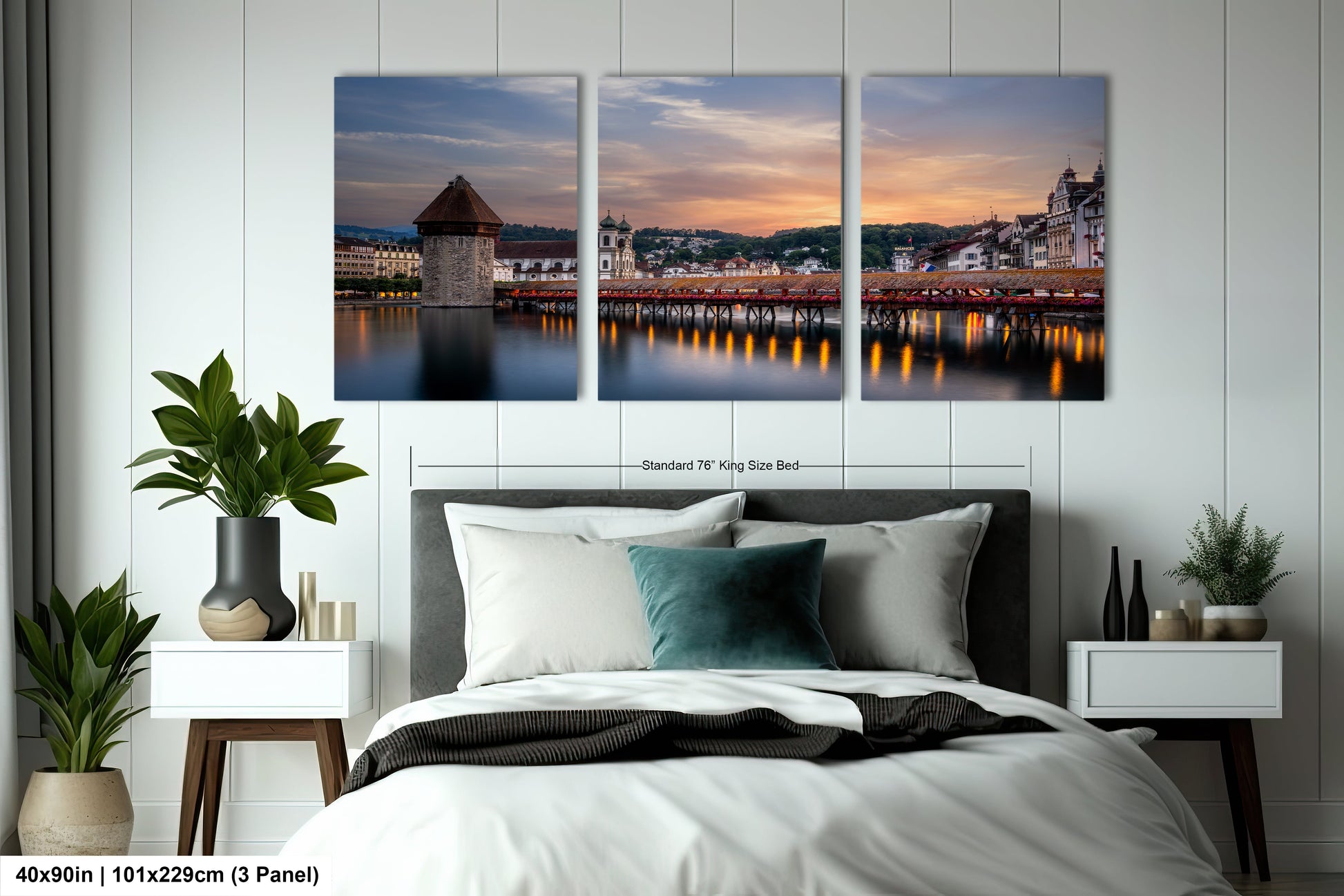 a bedroom with a large bed and three paintings on the wall