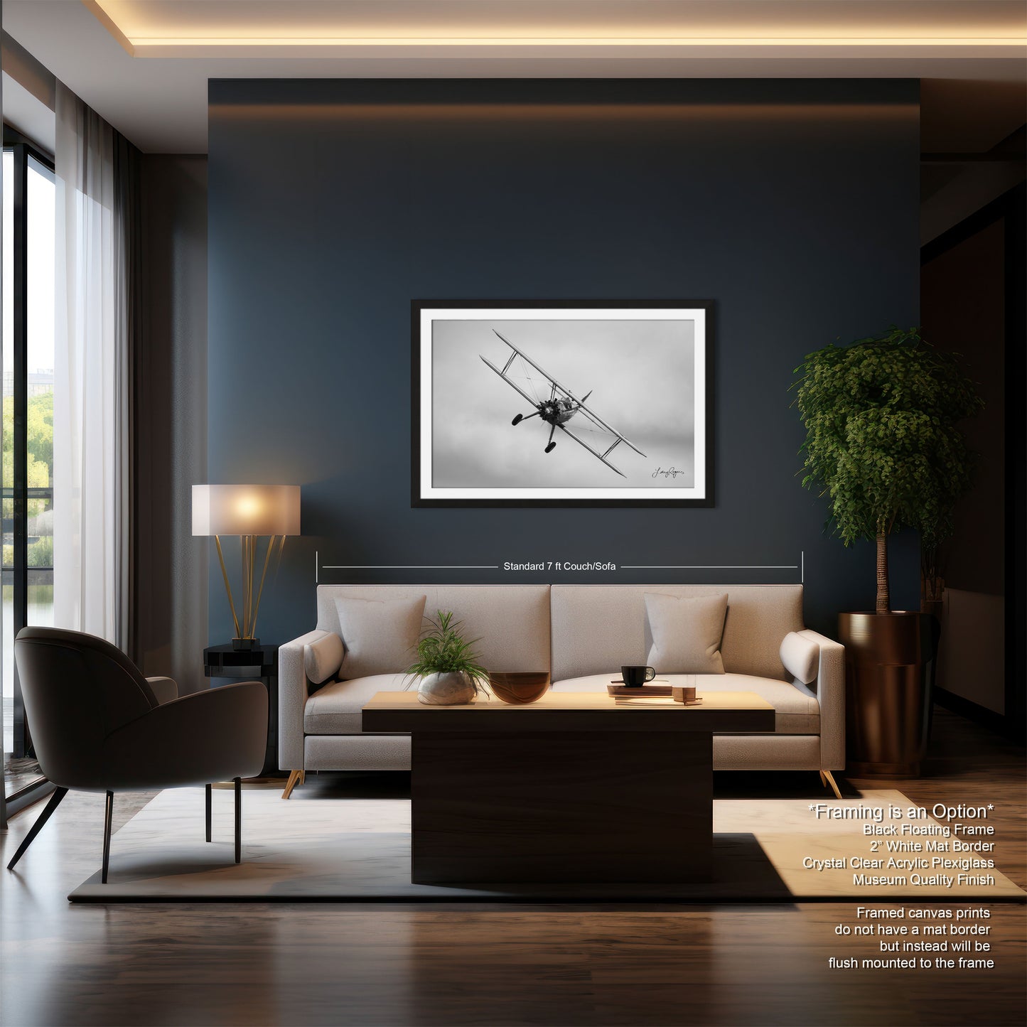 a living room filled with furniture and a painting on the wall