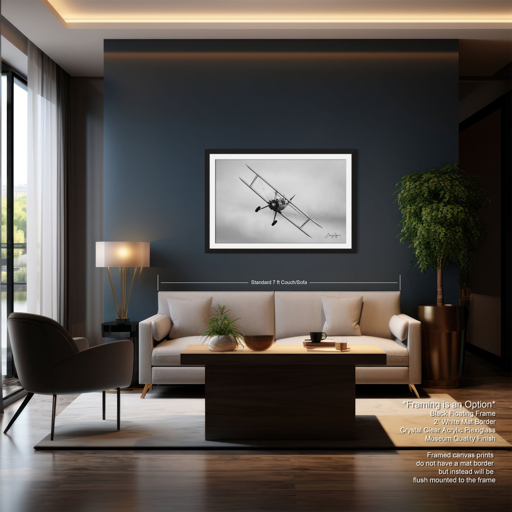 a living room filled with furniture and a painting on the wall