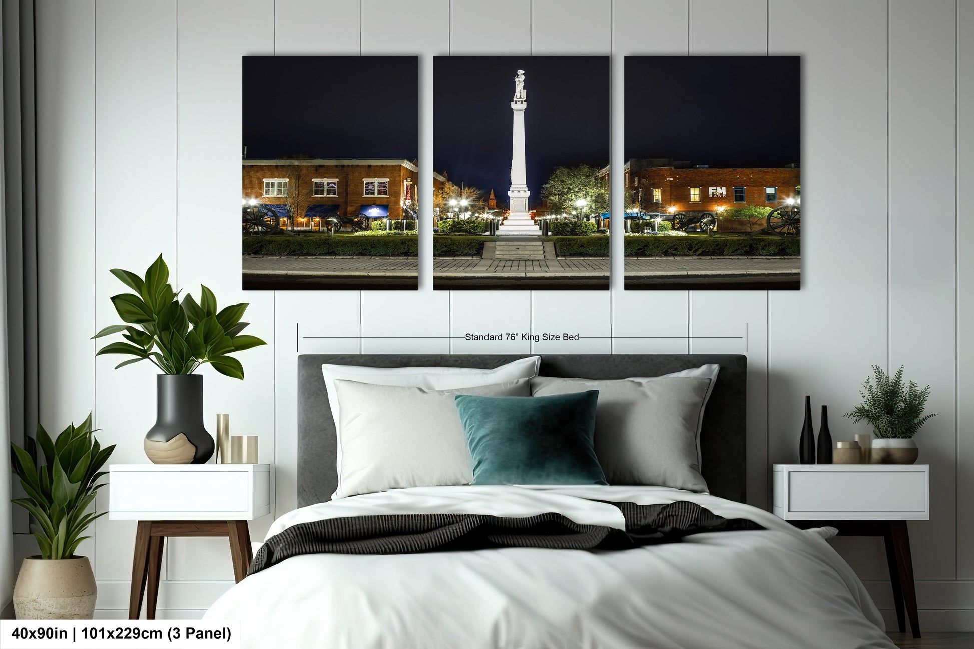 a bed room with a neatly made bed and three pictures on the wall