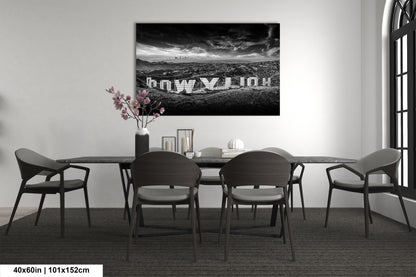 a black and white photo of a dining room table