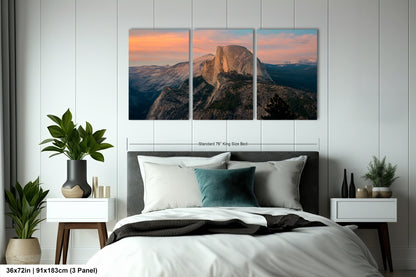 a bedroom scene with a bed and two paintings
