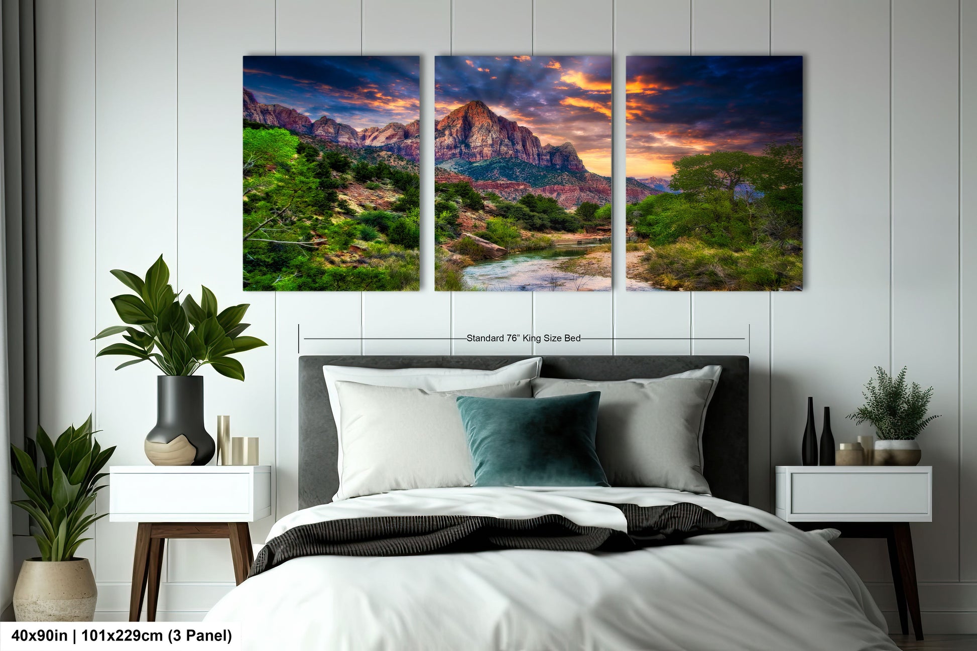 a bedroom with a bed and two paintings on the wall