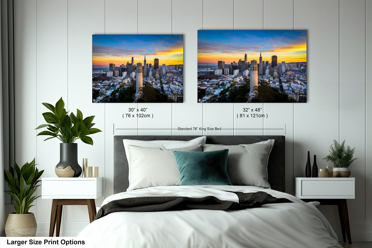 a bedroom with a bed and two pictures on the wall