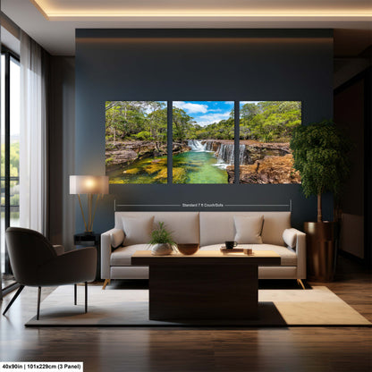 a living room with a couch and a painting on the wall