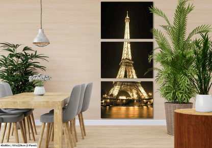 a room with a table and chairs and a picture of the eiffel tower