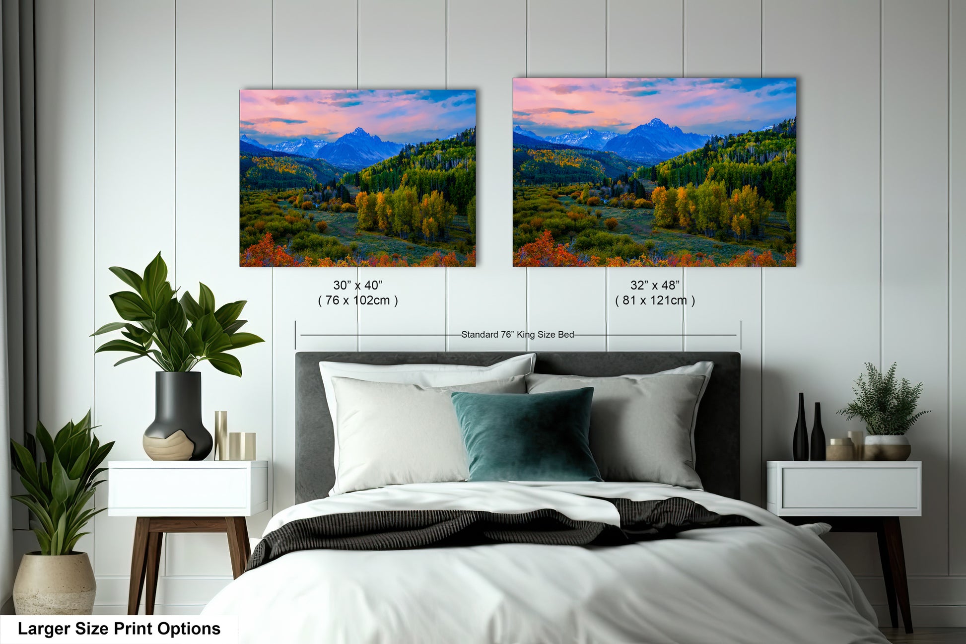 a bedroom with a bed and two pictures on the wall
