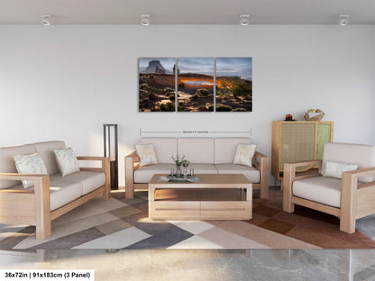 a living room filled with furniture and a painting on the wall