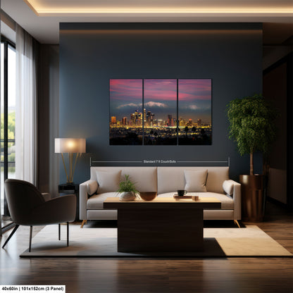 a living room filled with furniture and a painting on the wall