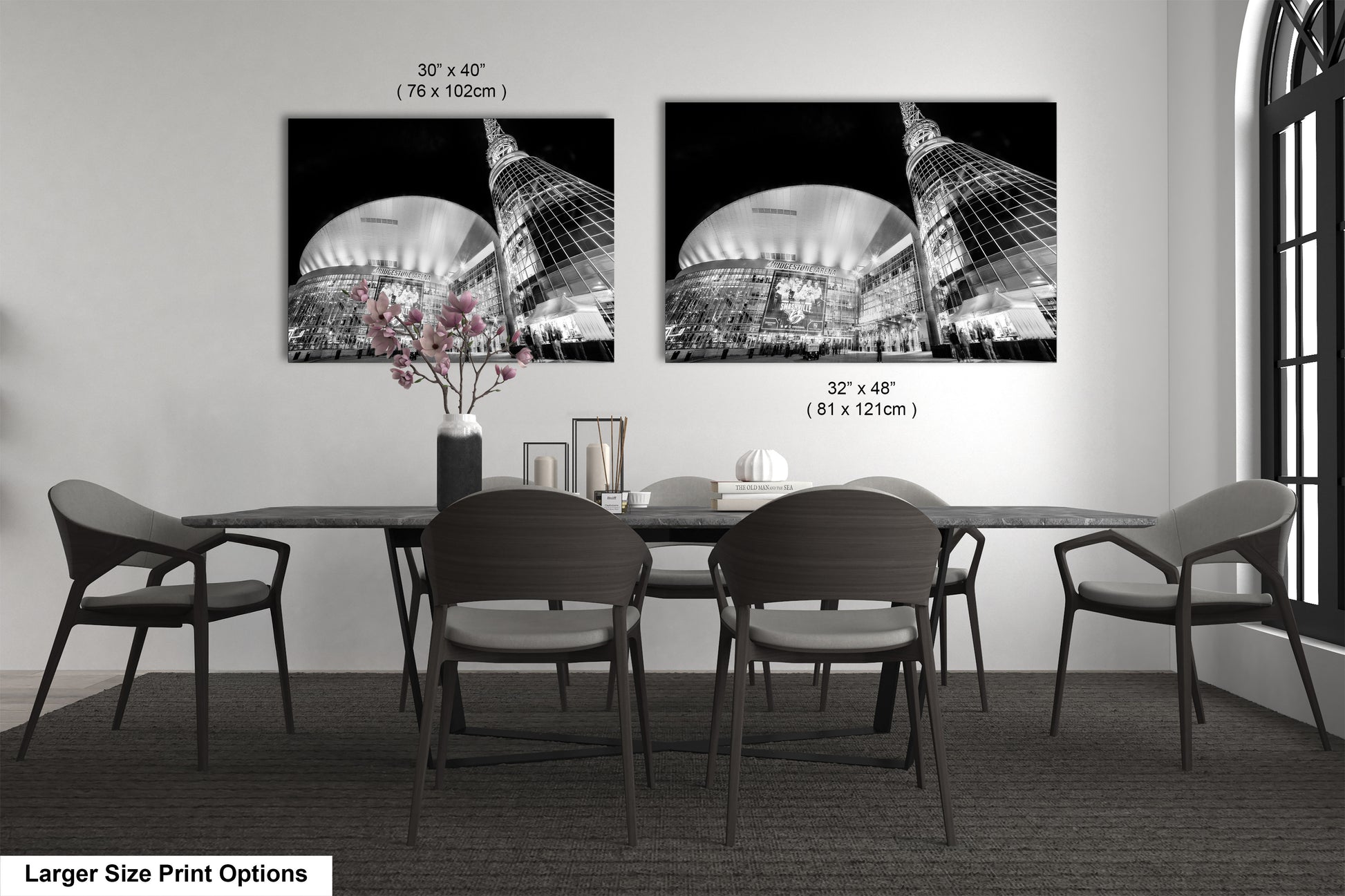 a black and white photo of a dining room