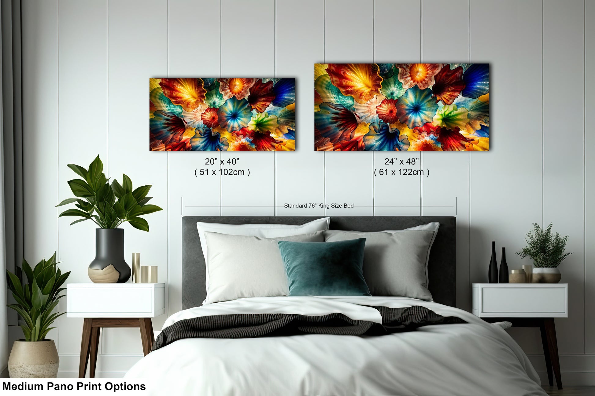 a bedroom with a large bed, two nightstands, and two paintings hanging on the wall above the bed.