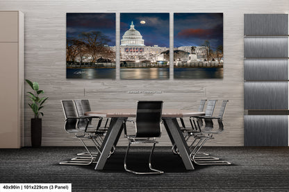 a dining room table with chairs in front of a picture of the capitol building