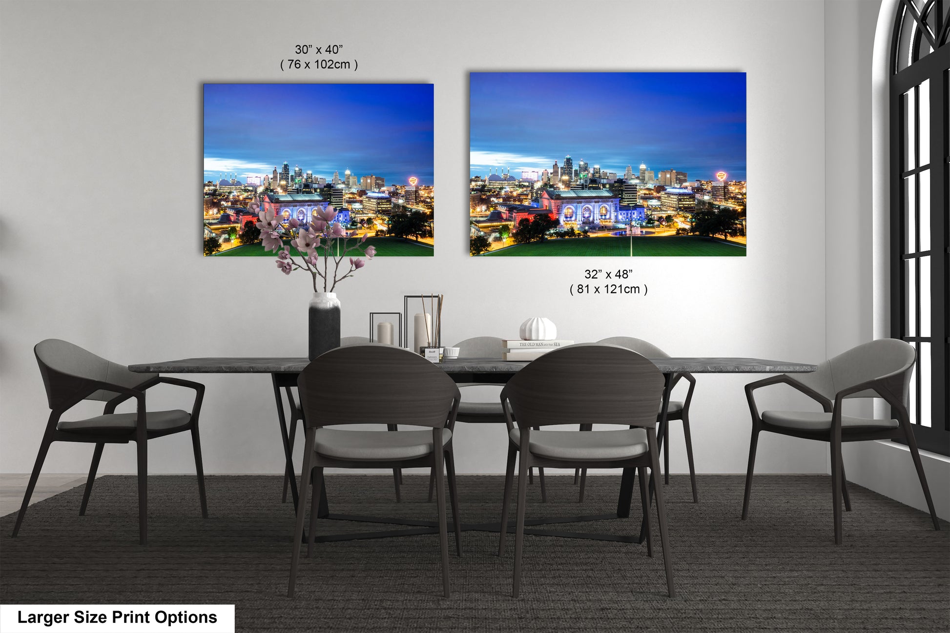 a dining room table with four chairs and a picture of a city