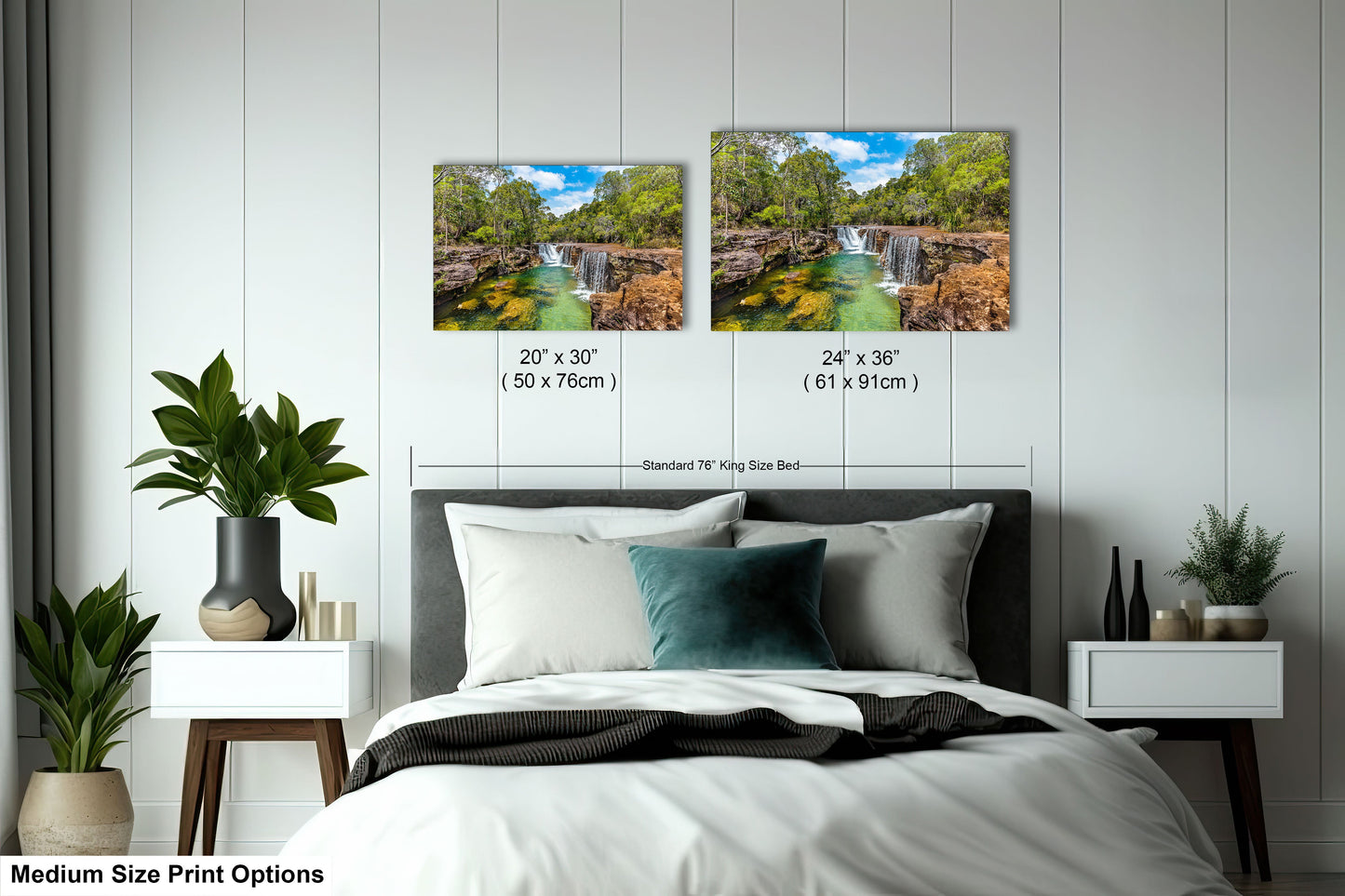 a bedroom with a bed and two pictures on the wall