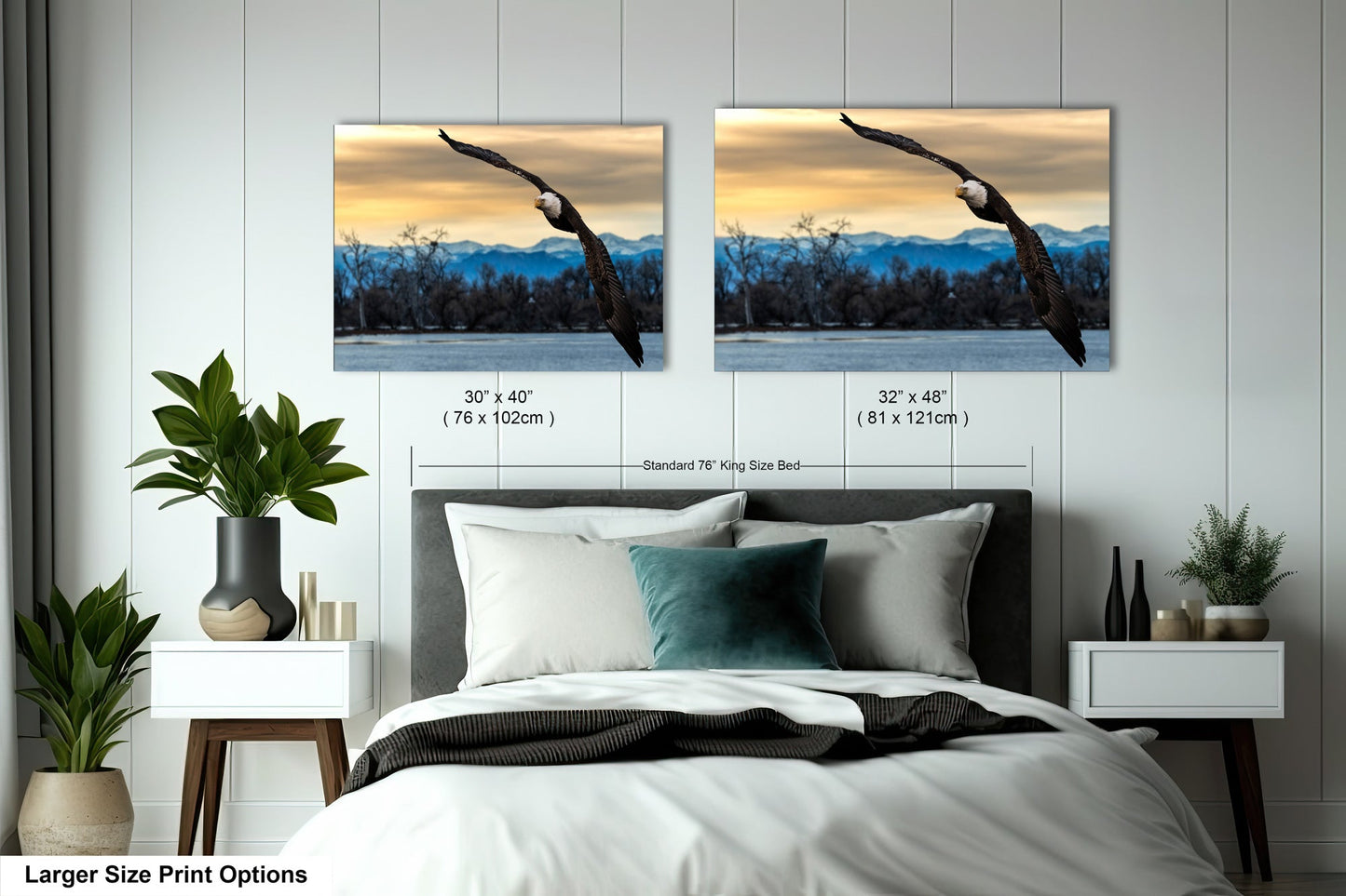 a bedroom with a bed and two pictures on the wall