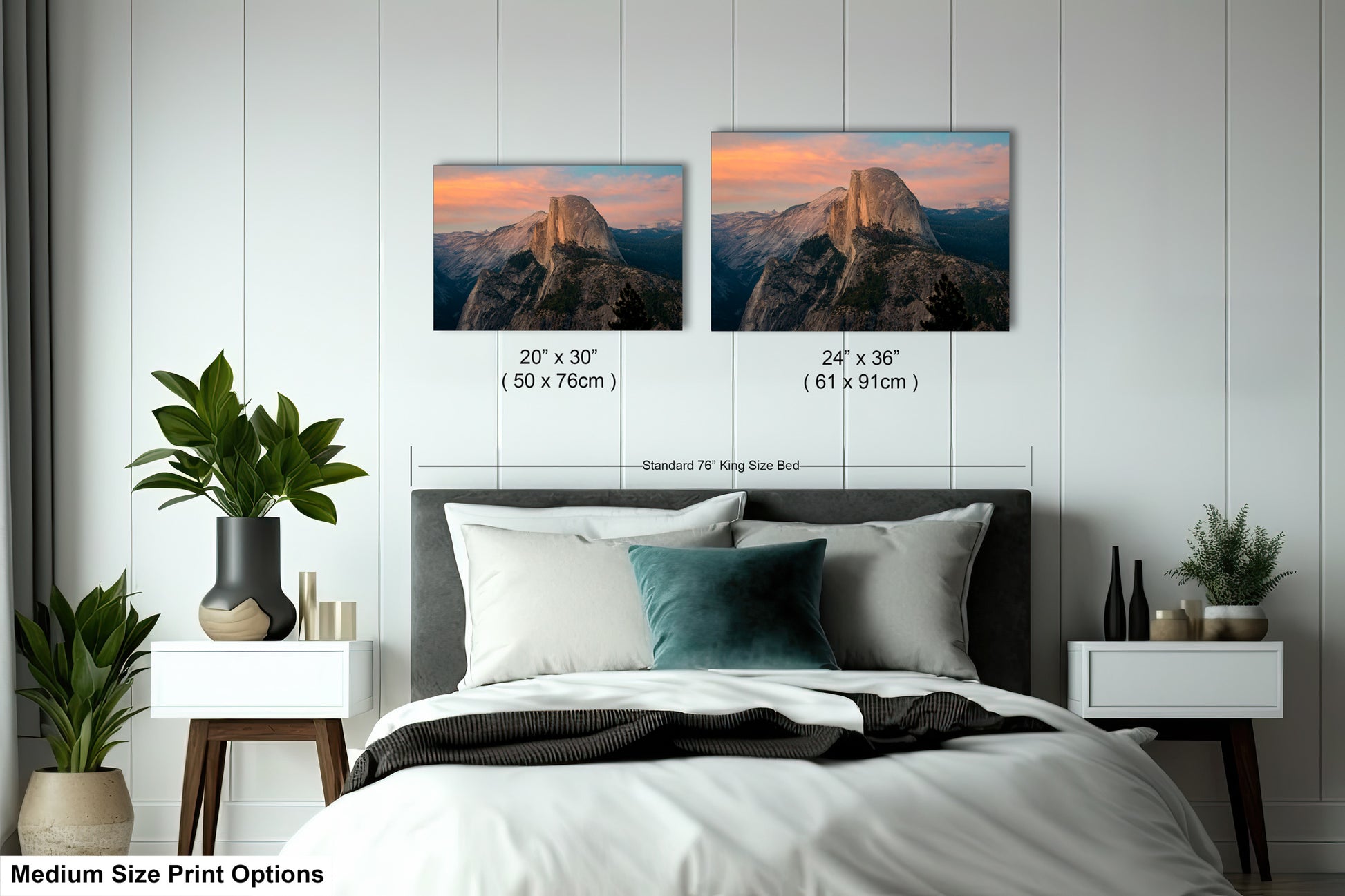 a bedroom with a bed and two pictures on the wall