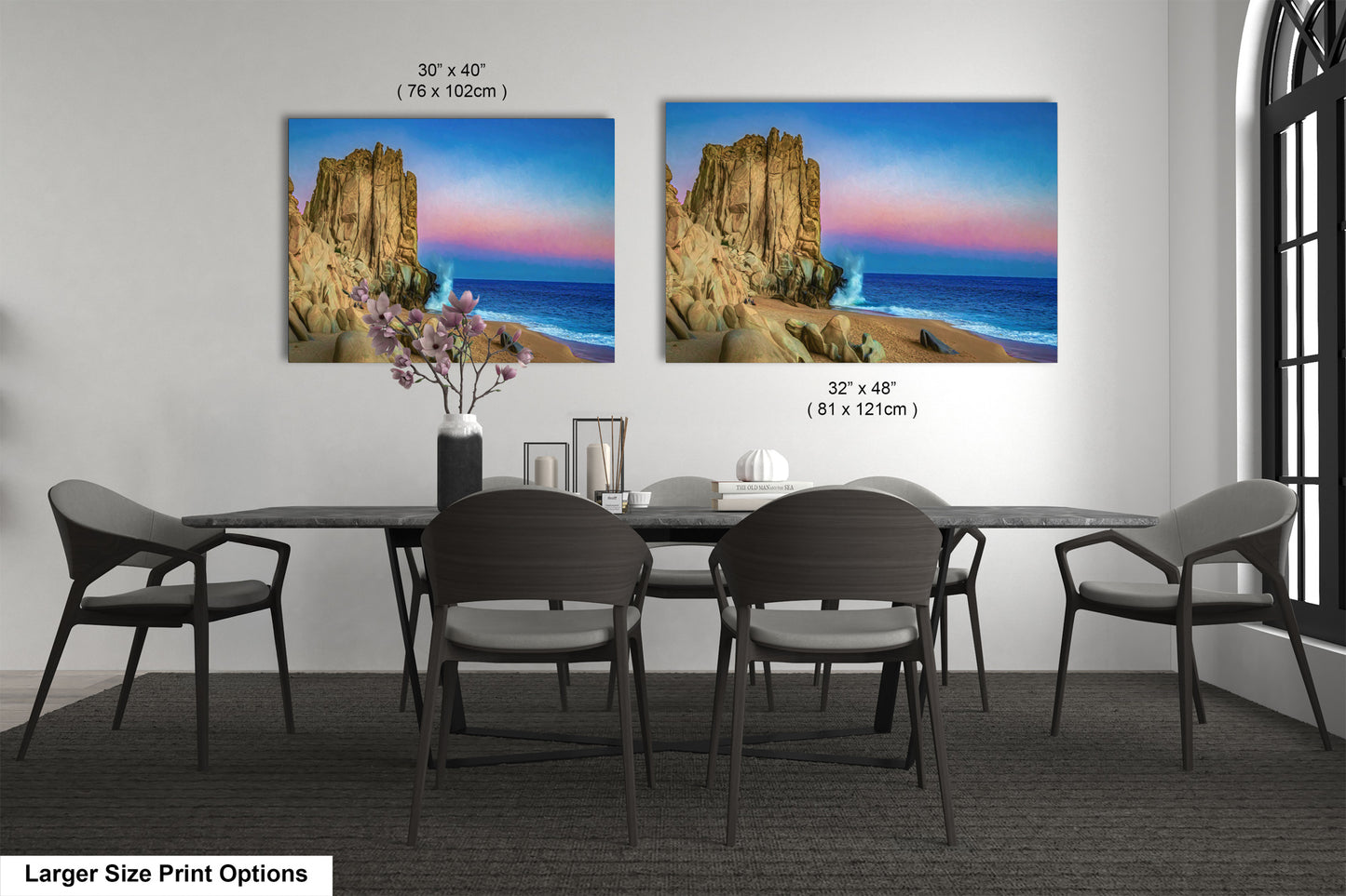 a dining room table with four chairs and a painting on the wall