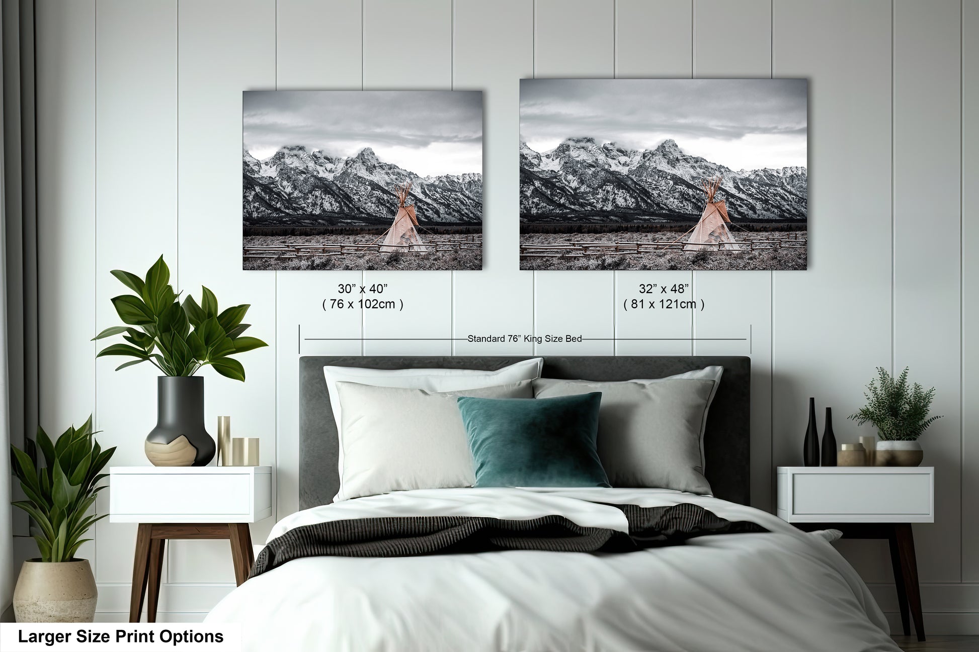 a bed with two pictures on the wall above it