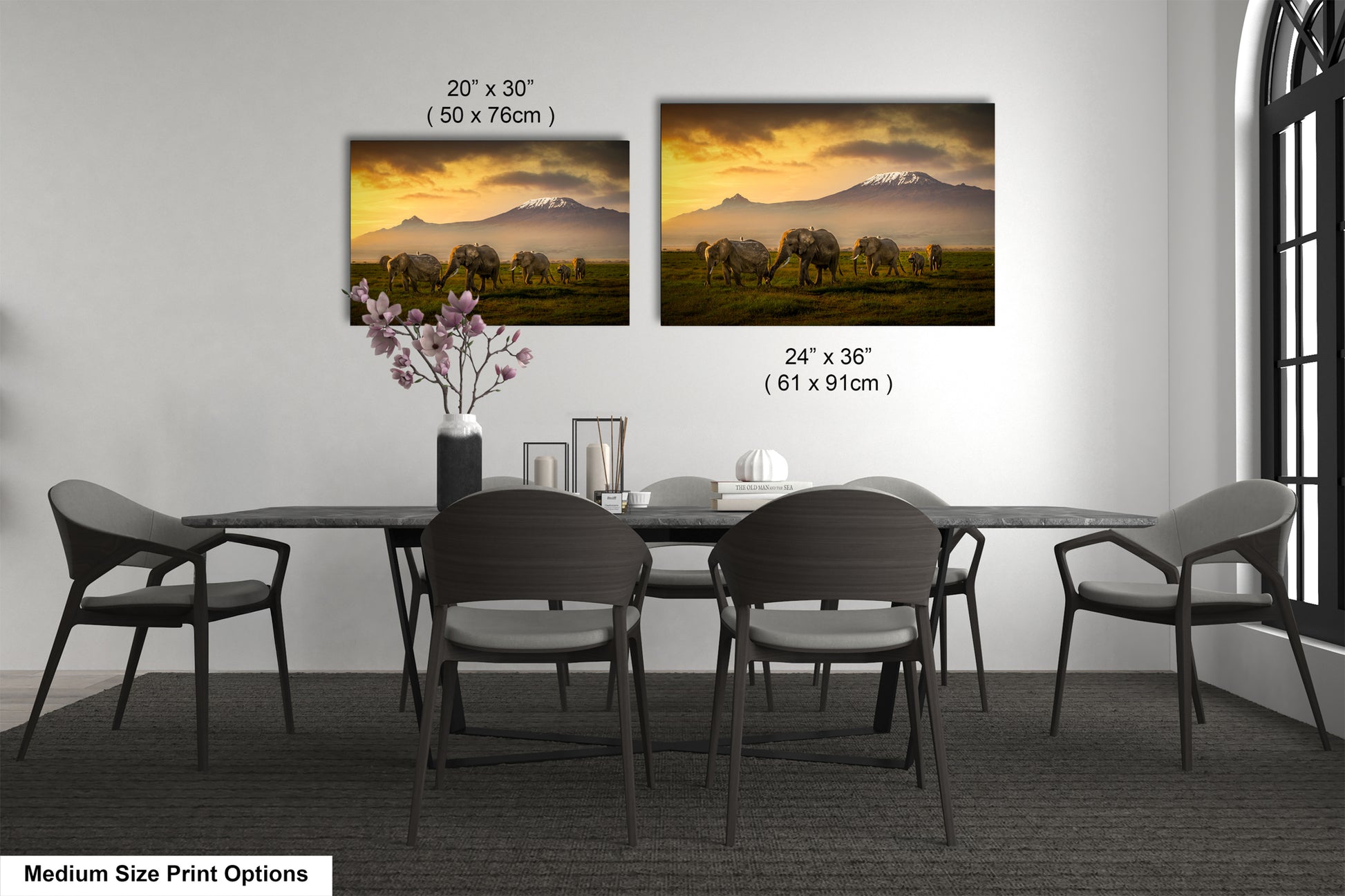 a dining room table with chairs and a vase of flowers