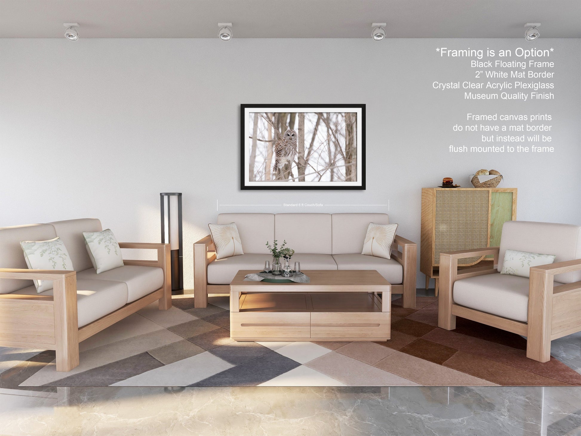 a living room filled with furniture and a painting on the wall