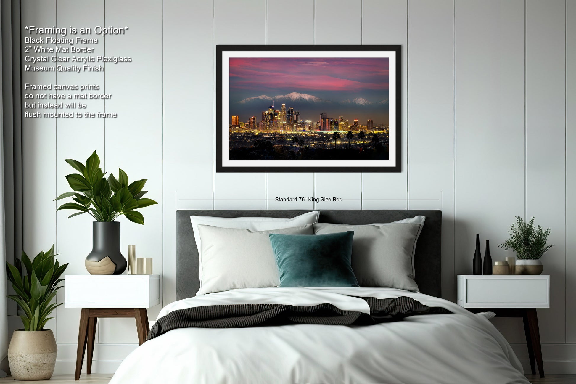 a bedroom with a bed and a picture hanging above it