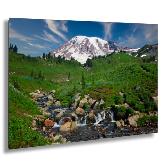 a mountain with a stream running through it