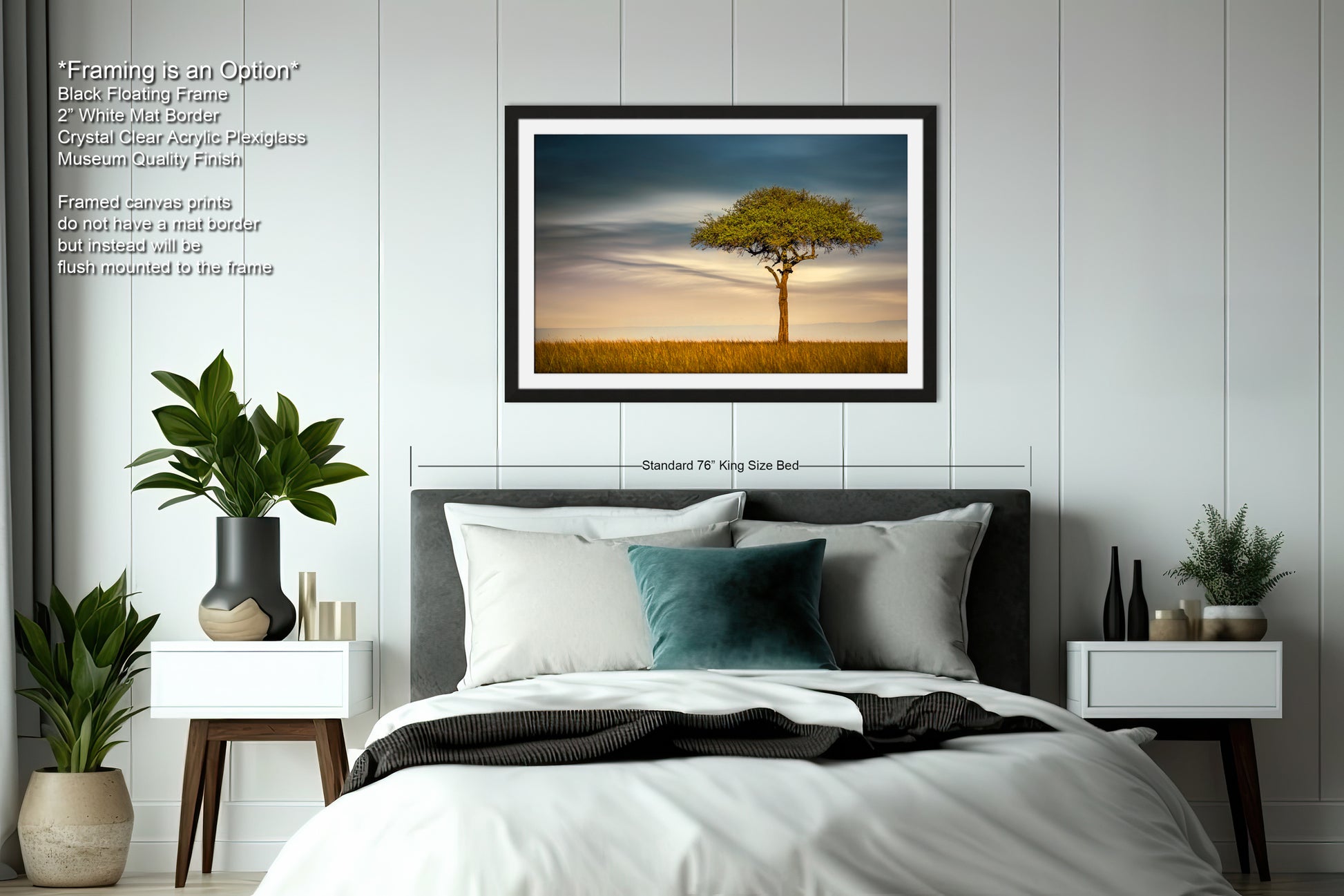 a bedroom with a bed and a picture hanging on the wall