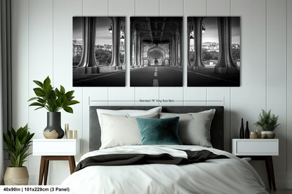 a black and white photo of a bedroom