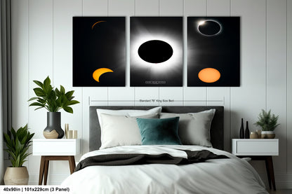 a bed with a white comforter and two paintings on the wall