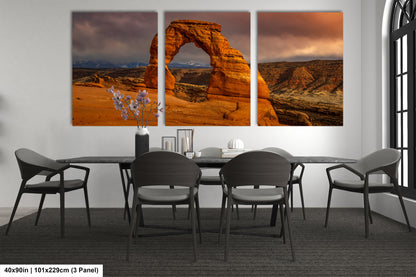 a dining room with a table and chairs
