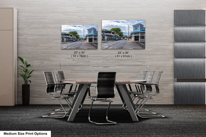 a dining room table with chairs next to a wall