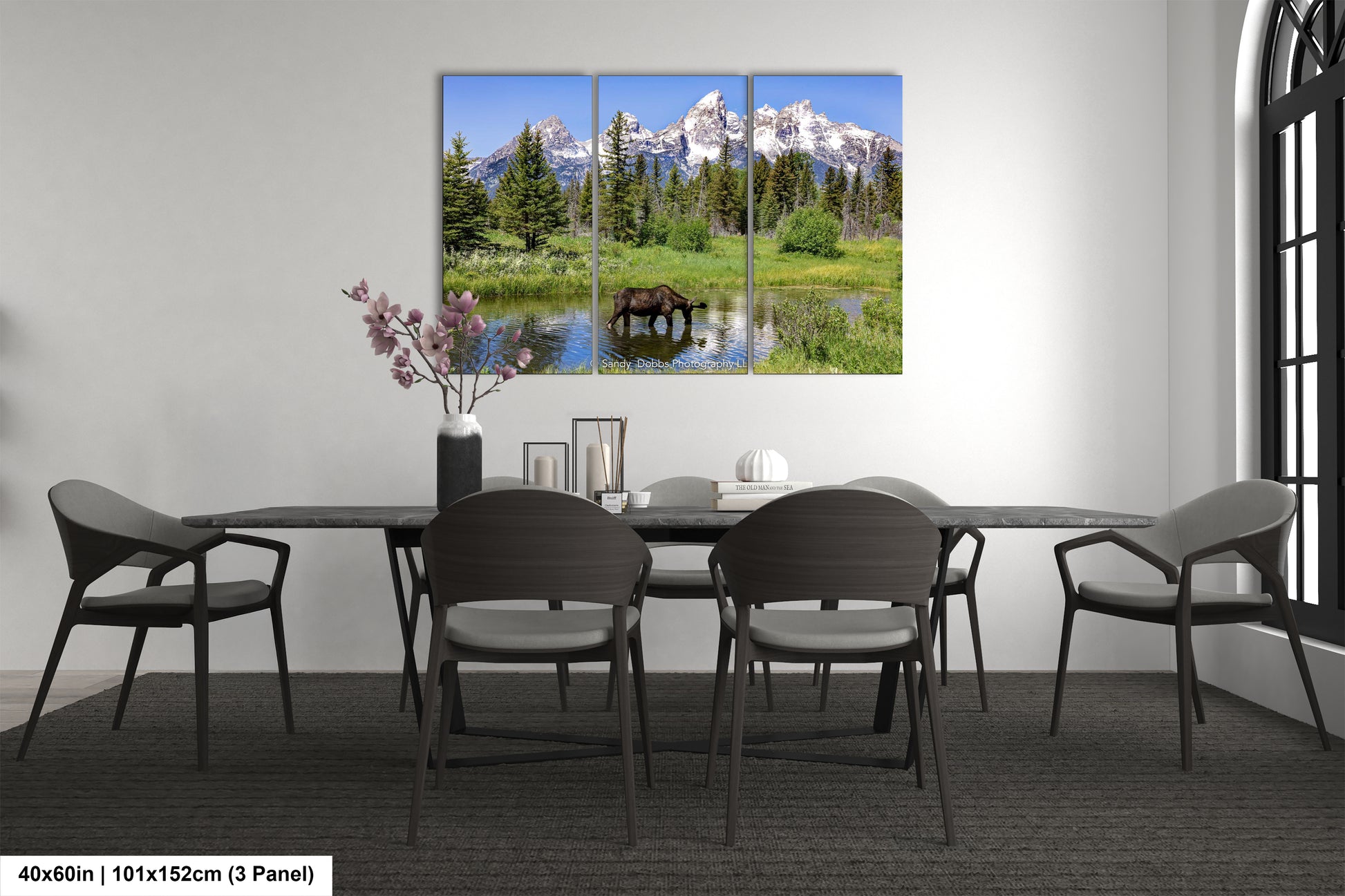 a dining room with a table and chairs