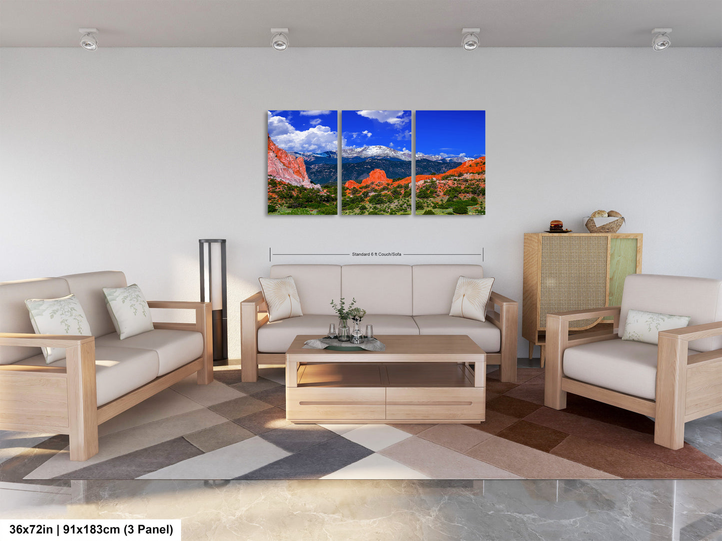 a living room filled with furniture and a painting on the wall