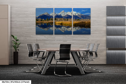 a dining room with a table and chairs