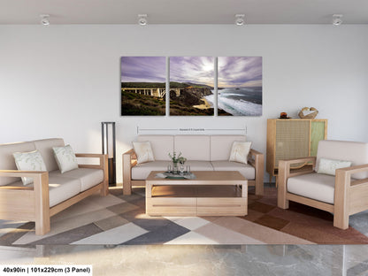 a living room filled with furniture and a painting on the wall