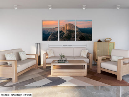 a living room filled with furniture and a painting on the wall