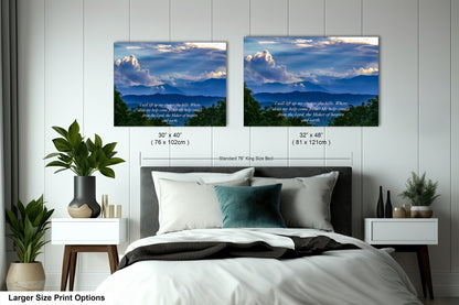 a bedroom with a bed and two pictures on the wall