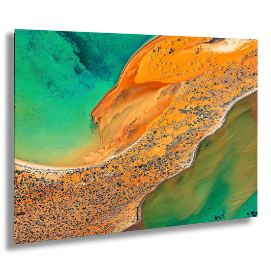 an aerial view of a beach and ocean