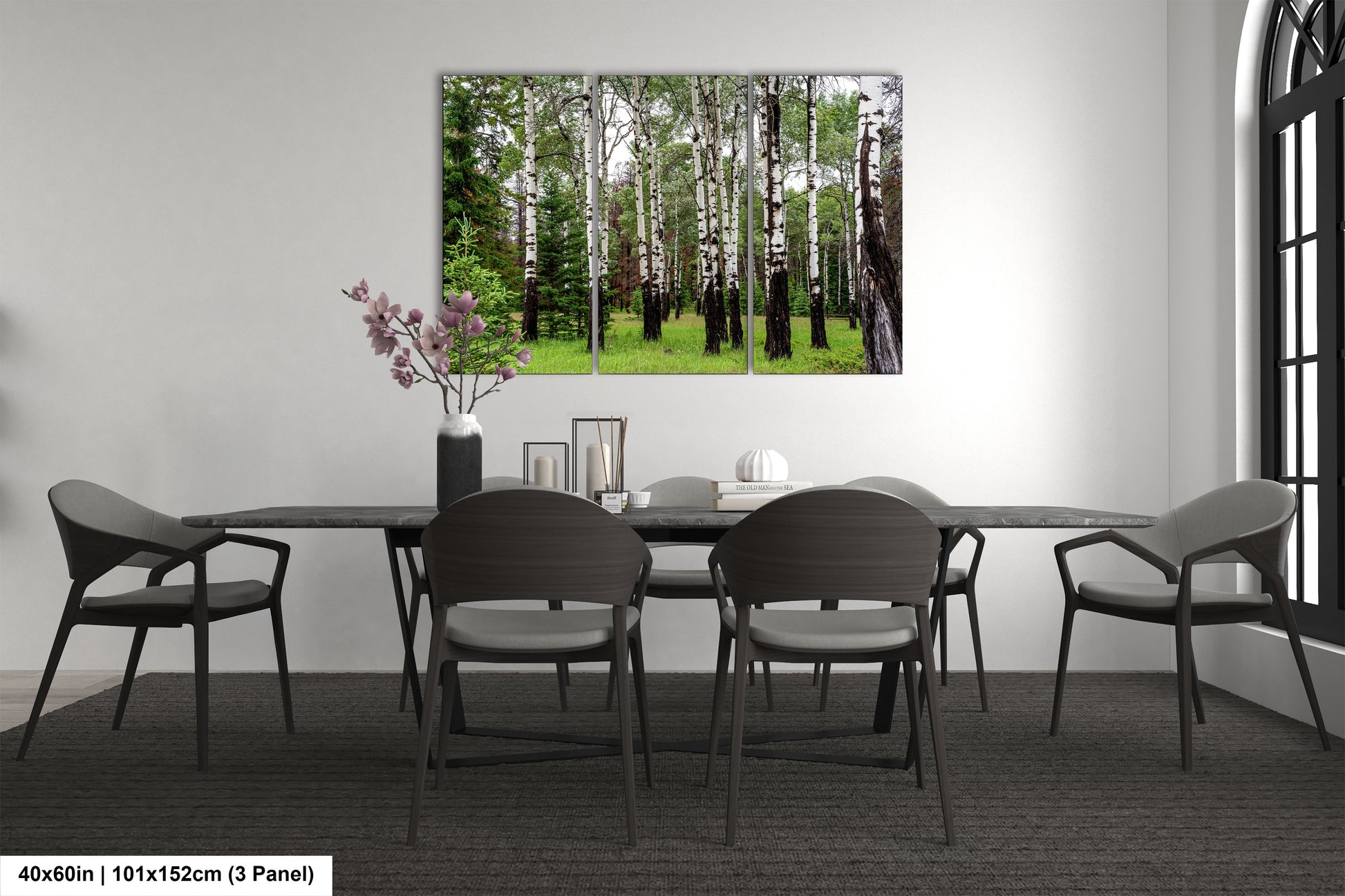 a dining room with a table and chairs