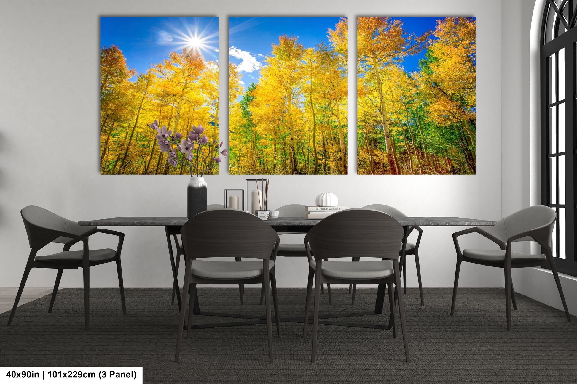 a dining room with a table and four chairs