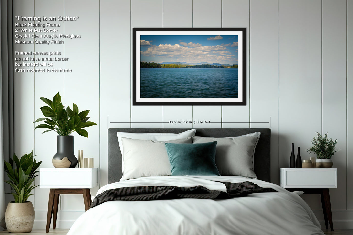 a serene bedroom scene with a large bed, nightstands, and a framed landscape photograph of a calm lake and blue sky above it.