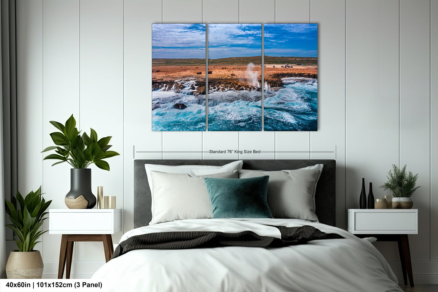a bedroom scene with focus on the bed and the ocean